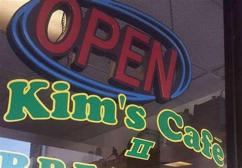 Kims cafe - KIm's Cafe looks like a long hallway with a few tables, a cashier in the middle and more seating in the rear. menu: vietnamese spring rolls, vermicelli and banh mi. friendly, courteous service. clean eating area. eats: curry chicken banh mi (6 in, 3.75)-on the small side, -tender tasteless chicken, curry very slight.